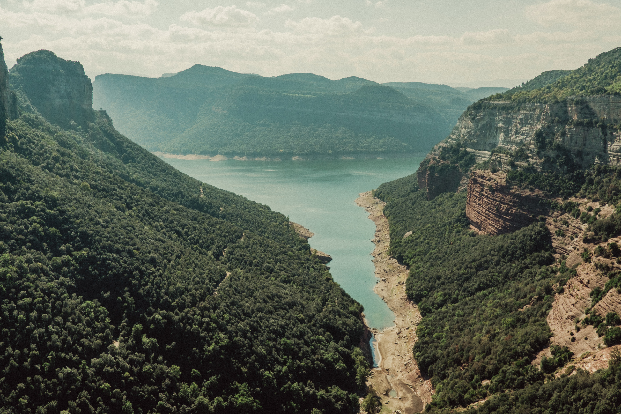 Aerial View of Mountains and Lake